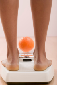 woman standing on the scale